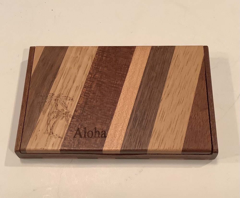 MIXED WOOD BUSINESS CARD HOLDER THAT SAYS ALOHA
