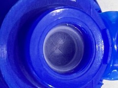Aptar-38-400 Blue Flip Top Tab Caps with valve. Quantity 1200 per box