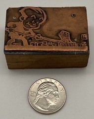 Vintage Printers Block Man Raking in Money Cartoon Graphic Copper