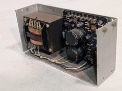 Power-One HCC24-2.4-A linear power supply +/-24VDC 2.4A, 100-240VAC as shown